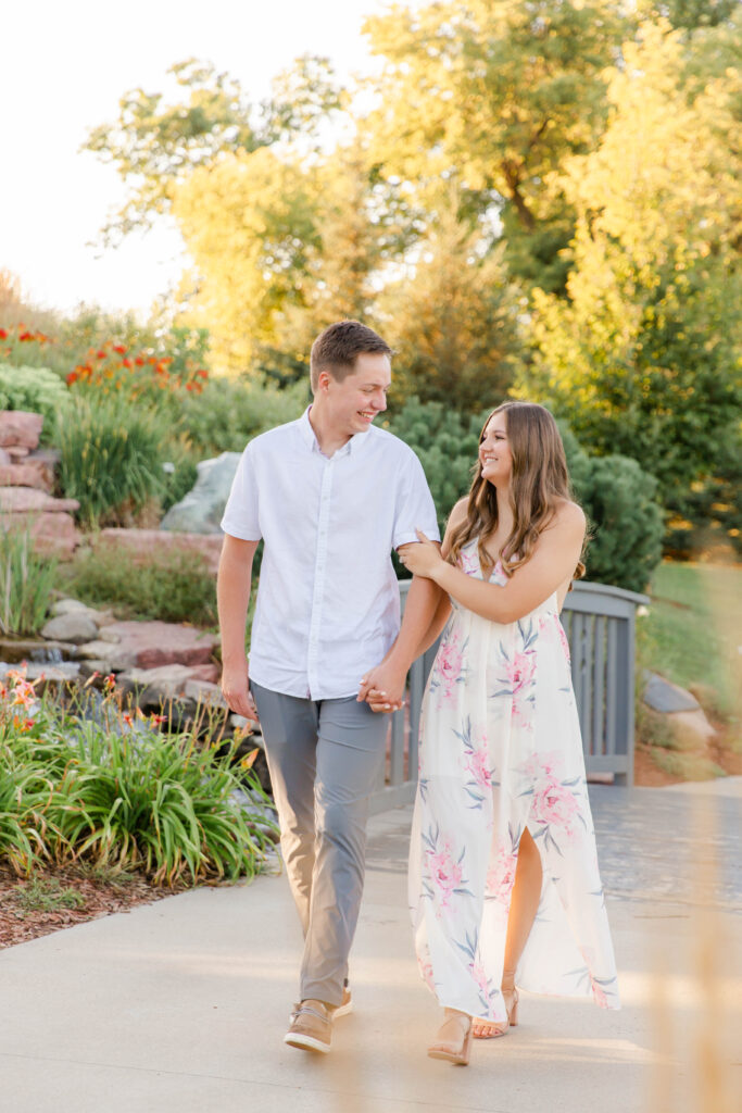 bride and groom pose for engagement photos in south dakota