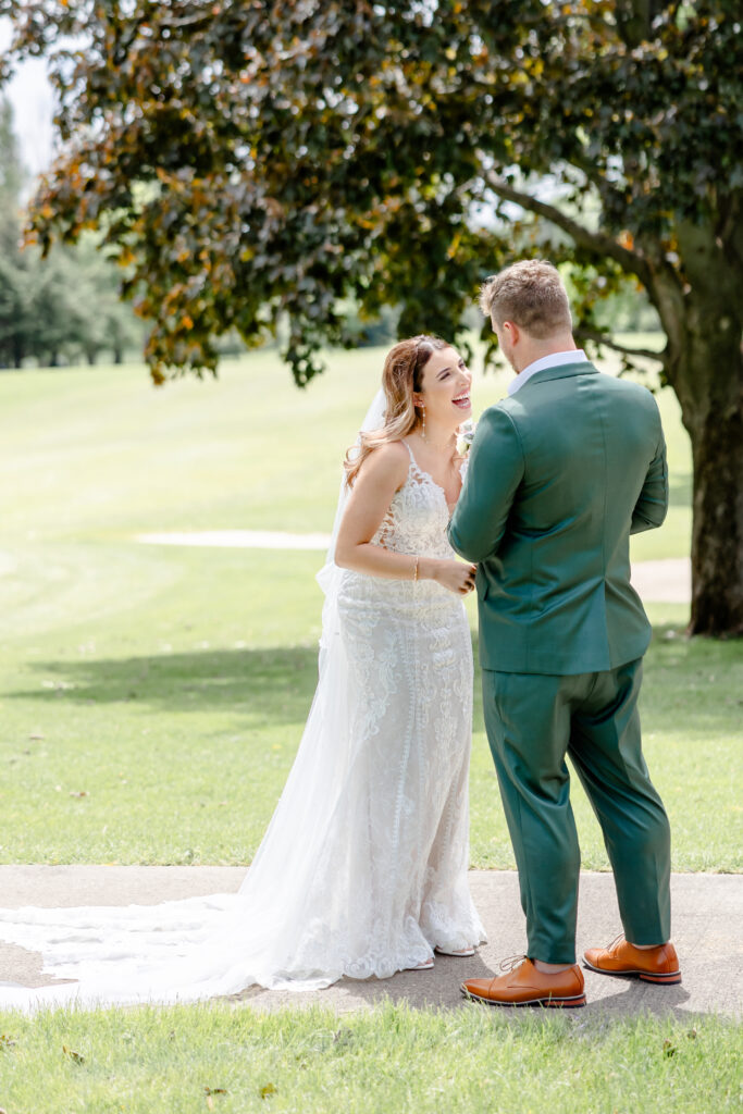 first look with bride and groom at golf course in sioux falls