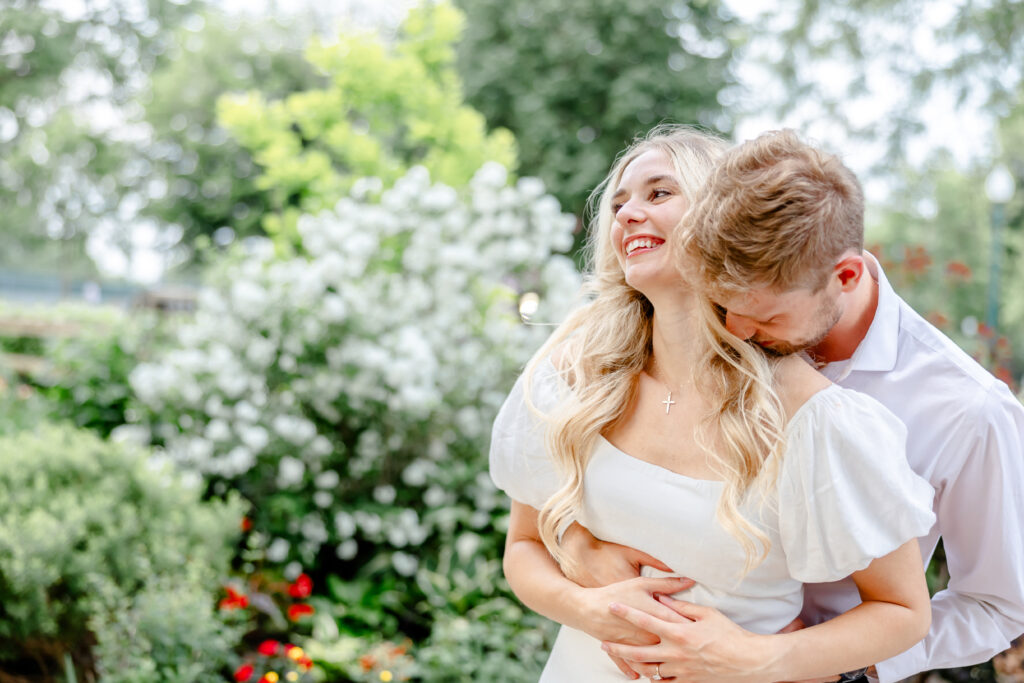 bride and groom posing for engagement photo